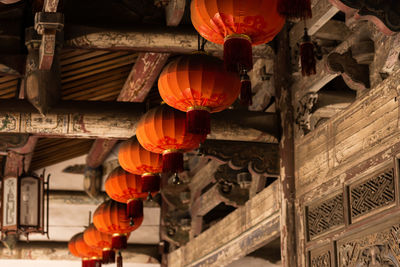 Low angle view of lanterns hanging in building