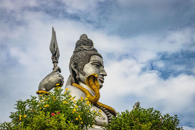 Shiva statue isolated at murdeshwar temple close up shots from unique angle