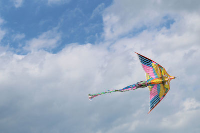 Low angle view of kite flying in the sky