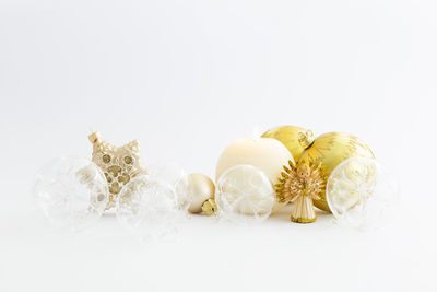 Close-up of candies against white background