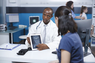 Business colleagues working at clinic