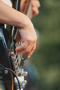 Detail of electric bass played during a show