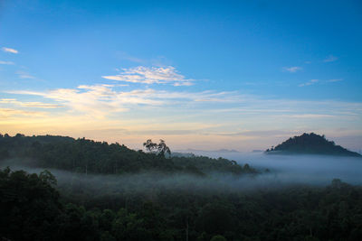 Scenic view of mountains against sky during sunset