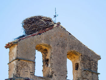 Low angle view of building against clear sky