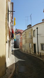 Houses against sky in city