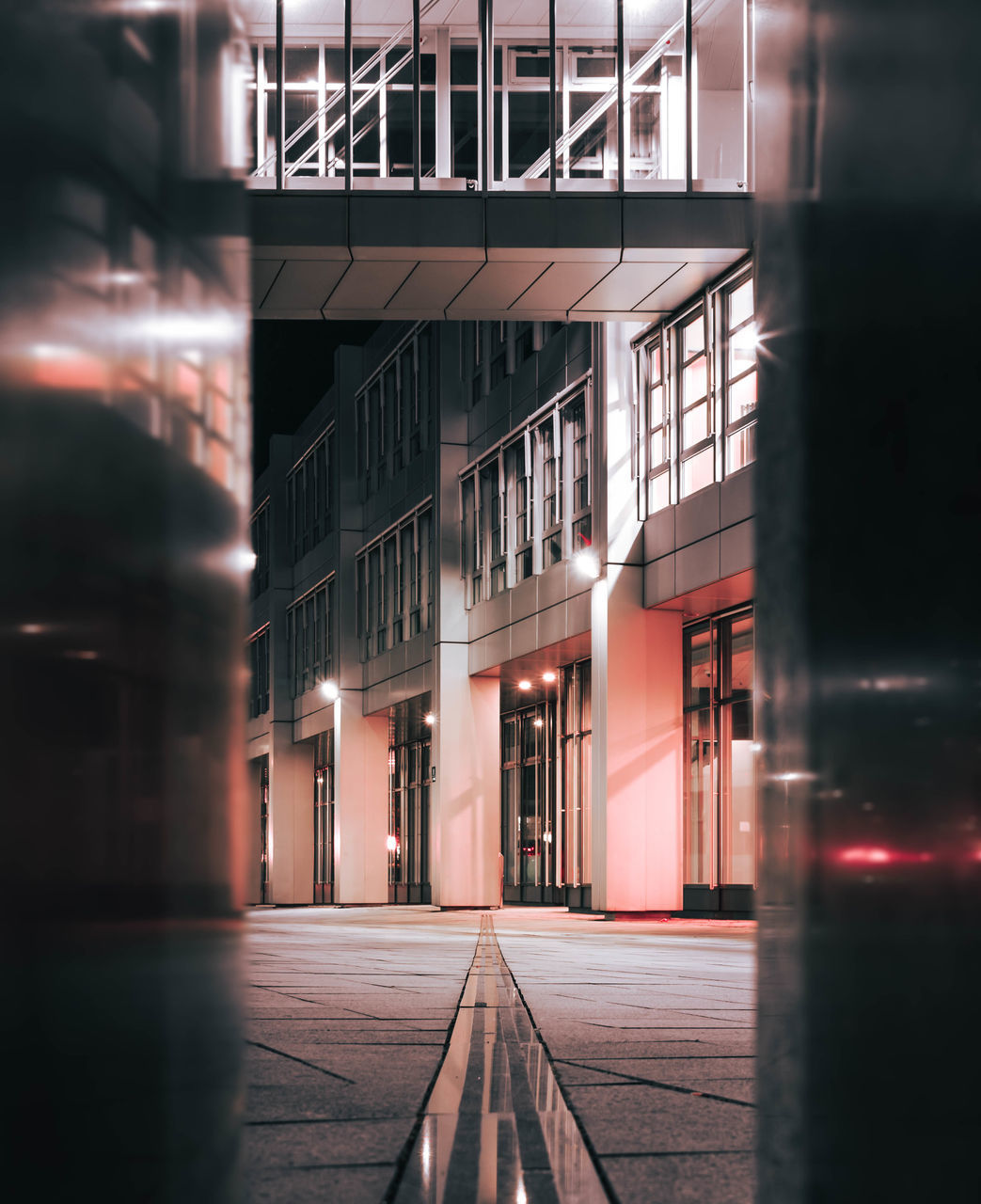 architecture, building exterior, built structure, building, illuminated, no people, night, reflection, city, glass - material, window, outdoors, selective focus, direction, blurred motion, sunset, the way forward, nature, modern, office building exterior, surface level