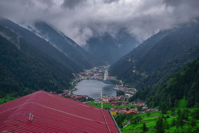 Panoramic view of building and mountains against sky