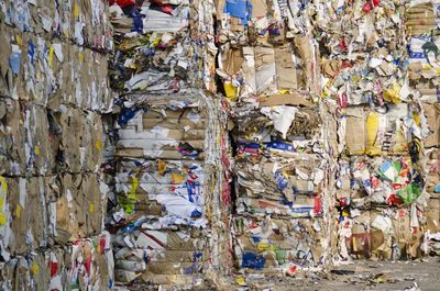 Stacks of cardboards for recycling at junkyard