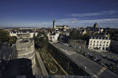 High angle view of buildings in city against sky