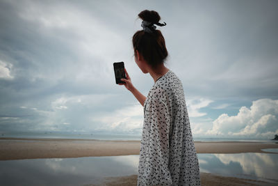 Young woman using mobile phone