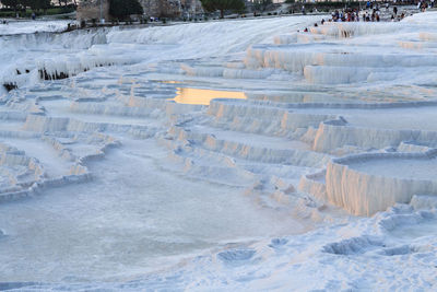 Aerial view of snow covered land