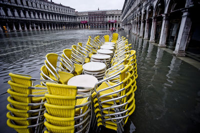 High angle view of chairs and tables on flooded street