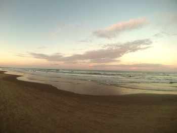 View of beach at sunset