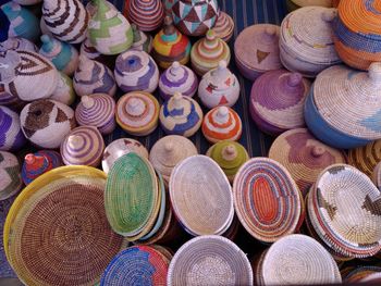 High angle view of multi colored craftwork for sale at market stall