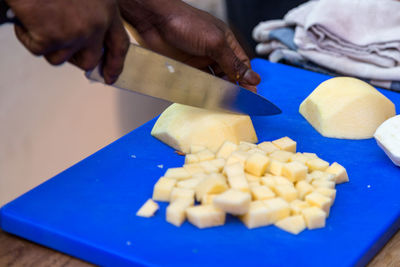 Close-up of man preparing food