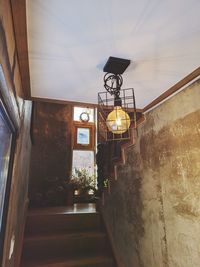 Low angle view of illuminated staircase in building