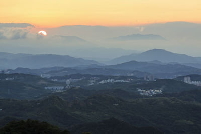 High angle shot of rocky landscape against sunset