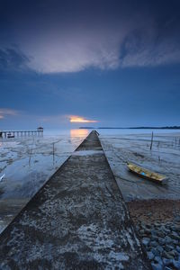 Scenic view of sea during winter against sky