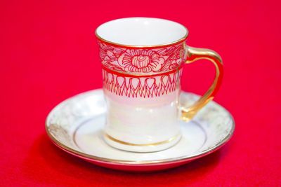 Close-up of coffee cup on table