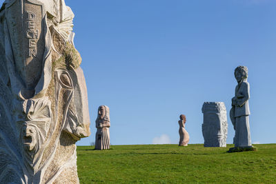 Carnoët, brittany france march 22th 2017 - granite statues in the valley of the saints