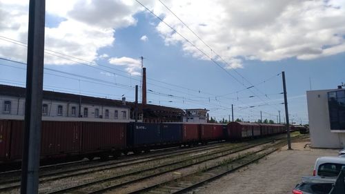 Train on railroad track against sky