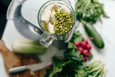 High angle view of fruits in jar on table