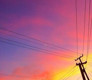 Low angle view of electricity pylon