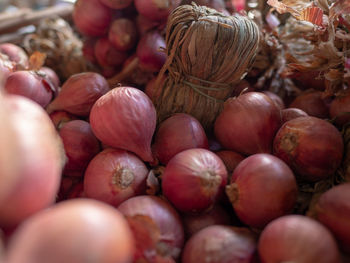 Full frame shot of onions in market