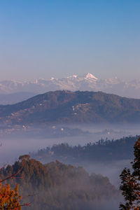 Scenic view of mountains against sky during sunset