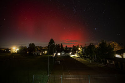 Illuminated road at night