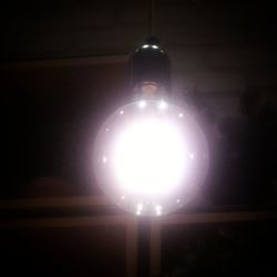Low angle view of illuminated light bulb