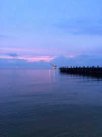 Scenic view of sea at sunset