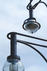 Low angle view of metal structure against sky