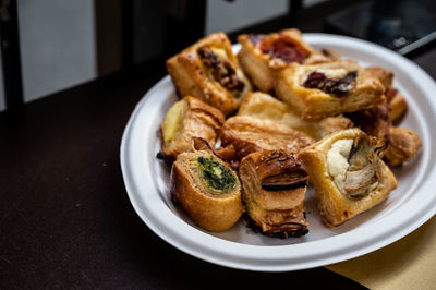 A plate of savoury pastry, selections of toppings