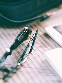 Close-up of sunglasses on table