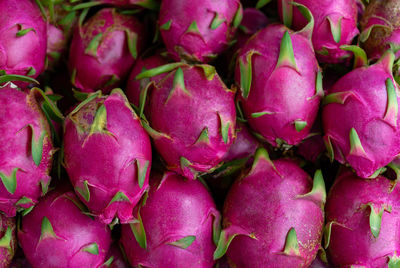 Full frame shot of pink fruits for sale in market