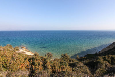 Scenic view of sea against clear sky