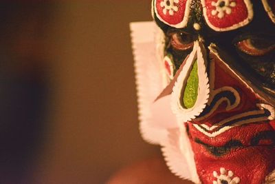 Close-up portrait of man with spooky face paint