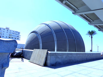 Buildings against clear sky