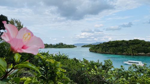 Scenic view of sea against cloudy sky