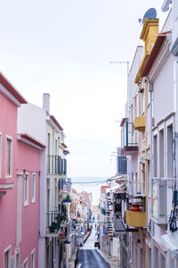 An empty old street leading to the ocean, in the historic center of the portuguese city of nazare