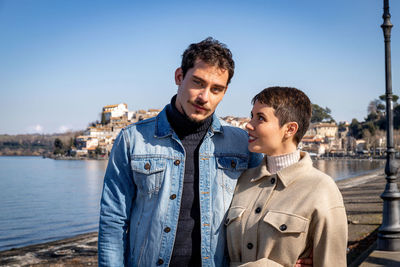 Couple traveling to anguillara sabazia in italy.romantic atmosphere and copy space for your message.