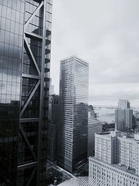 Modern buildings in city against sky