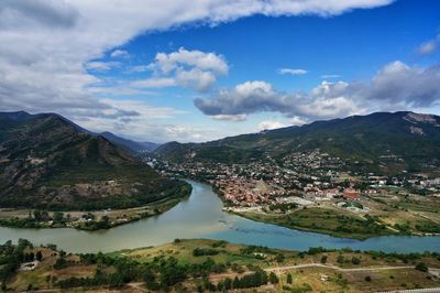 Aerial view of lake against cloudy sky