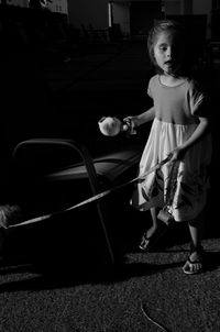 Full length of girl standing on carpet