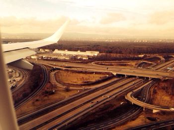 High angle view of landscape seen through airplane window