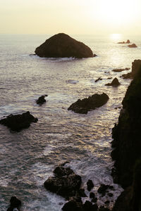 Scenic view of sea against sky during sunset