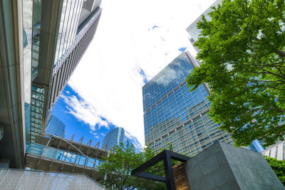 Low angle view of modern buildings against sky