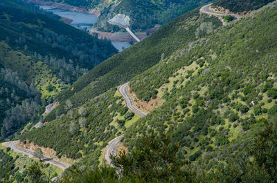 High angle view of green landscape against sky