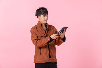 Young man looking at camera